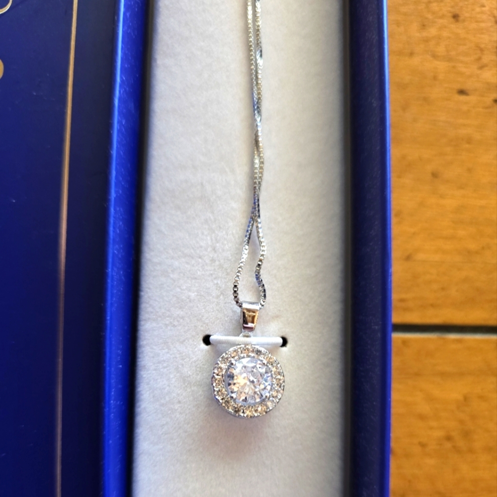 NEW genuine Blue Steel stainless steel crystal and cubic zirconia pendant.